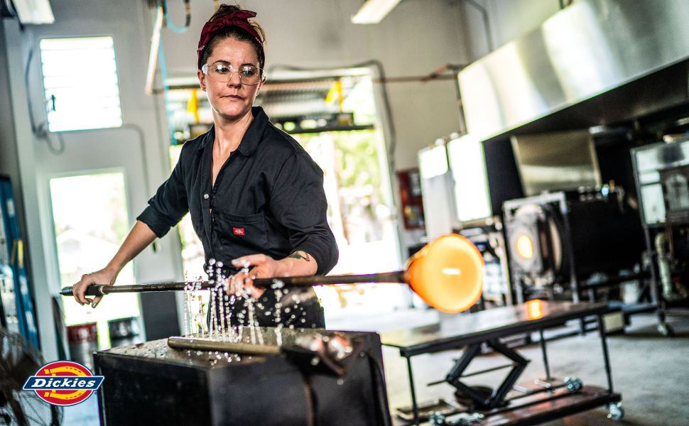 WOMAN WORKING WITH MOLTEN GLASS